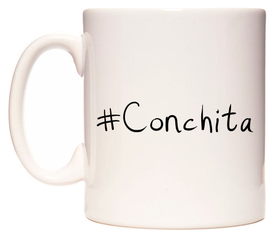 This mug features #Conchita
