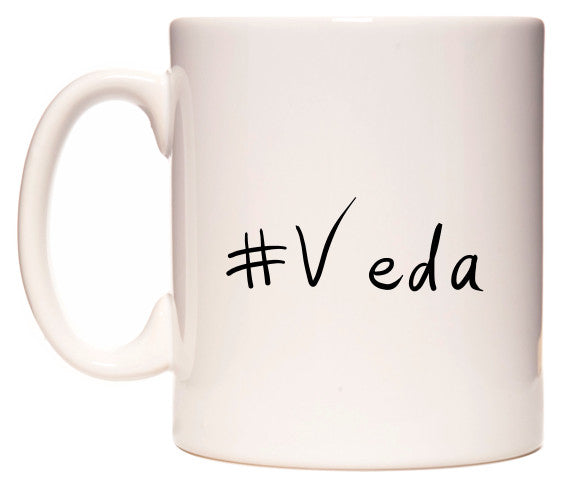 This mug features #Veda